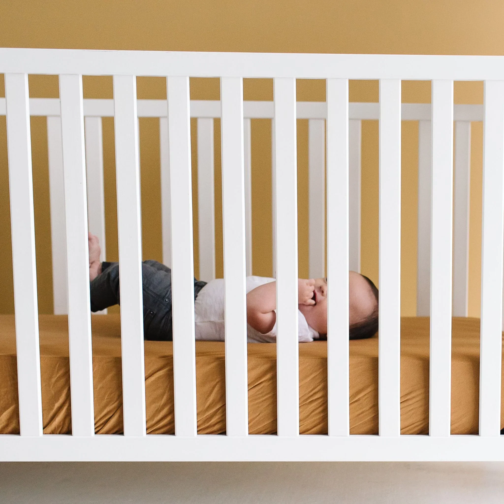 Copper Pearl Premium Knit Fitted Crib Sheet in Camel - Image 2