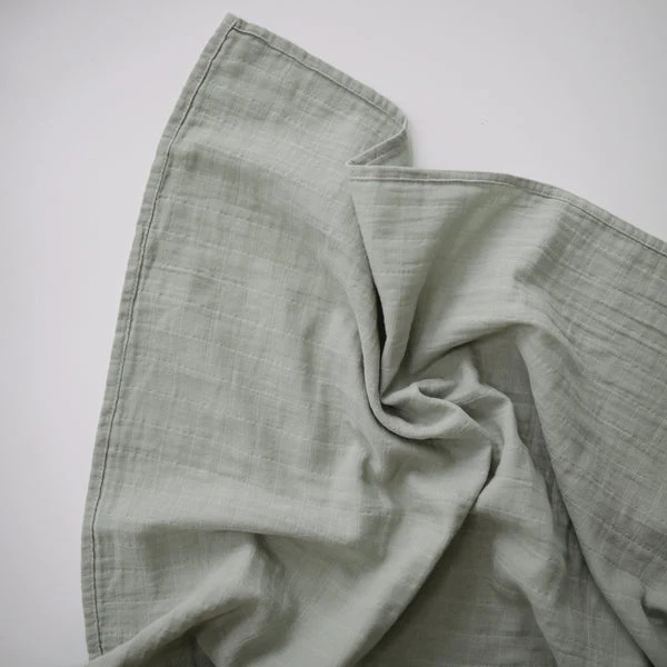 Mushie Muslin Organic Cotton Swaddle Blanket - Sage - Image 3
