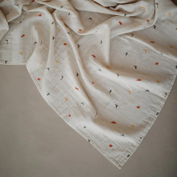 Mushie Muslin Organic Cotton Swaddle Blanket - Dinosaurs - Image 3